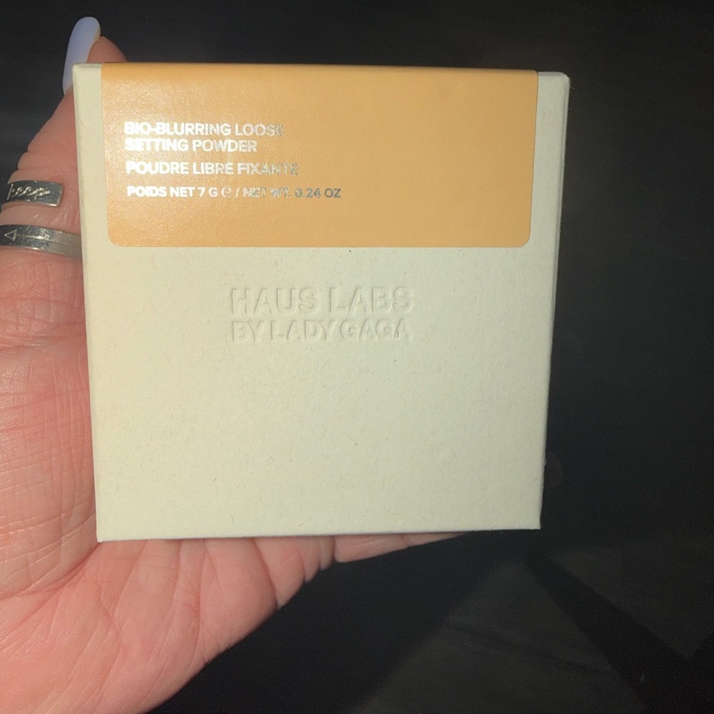 Haus Labs by Lady Gaga loose setting powder in color golden